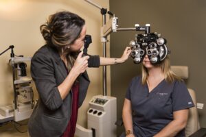 Dr. Dopkiss examining a patient